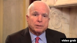 Жон Маккейн.