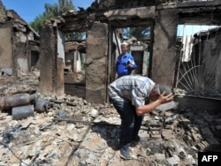 Пострадавший район в Оше, 2010 г.