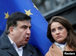 Former Odesa Governor Mikheil Saakashvili (left) and Yulia Marushevska, former head of the Odesa customs office, both resigned from their posts, accusing President Petro Poroshenko of corruption and a lack of political will.