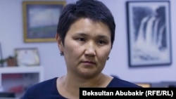 Рита Карасартова.