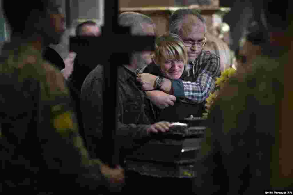 Natalia Pohoreltseva at the funeral for her son, Andriy Melnyk, in Lviv on May 14. Twenty-three-year old Andriy was&nbsp;a Ukrainian soldier killed fighting in the eastern Kharkiv region.