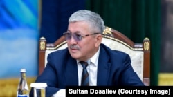 Адылбек Касымалиев.