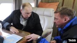 Владимир Путин разговоря с Роман Старовойт, когато вторият е начело на проекта по строежа на Керченския мост.