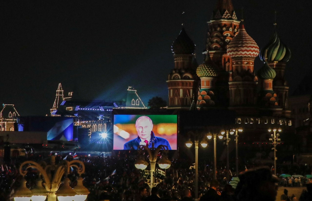 Russian President Vladimir Putin is seen on a screen during the broadcast of a concert marking the declared annexation of the Russian-controlled territories of four Ukraine's Donetsk, Luhansk, Kherson and Zaporizhzhya regions.