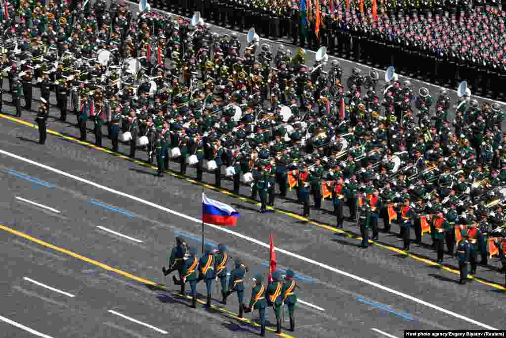 Russian servicemen attend the Victory Day parade.&nbsp;&nbsp;Russia has reported 600,000 coronavirus infections, giving it the third-highest number in the world. The official death toll stands at more than 8,000, but the real number is believed to be much higher.