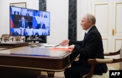 Президент Росії Володимир Путін головує на засіданні Ради Безпеки в режимі відеоконференції в Кремлі в Москві, Росія, 14 листопада 2025 року