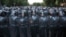 Armenia -- Police block a street during a protest against an increase of electricity prices in Yerevan, June 23, 2015