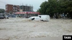 Flooding hits the Black Sea resort town of Gelendzhik on July 7, where nine people were reported dead.