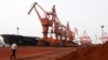 Soil containing various rare-earth elements waits to be loaded on to a ship at a port in Lianyungang, China. (File photo)