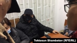 Бажы кызматынын төрагасынын мурдагы орун басары Райымбек Матраимов сот залында. 2021-жылдын 11-февралы