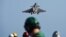 At Sea -- A French Rafale fighter aircraft takes off with bombs from the French aircraft carrier Charles-de-Gaulle, at eastern Mediterranean sea, November 23, 2015