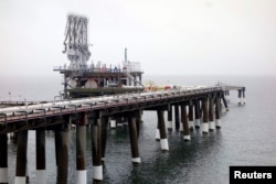Пирс завода по производству сжиженного природного газа Cove Point компании Dominion в Чесапикском заливе штата Мэриленд. США, 5 февраля 2014 года