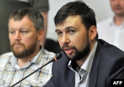 ანდრეი პურგინი და დენის პუშილინი (მარჯვენა). 2014 წ.