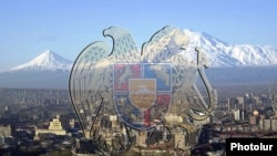 Armenia - A picture of the Armenian coat of arms juxtaposed against a view of Yerevan and Mount Ararat, July 5, 2011.