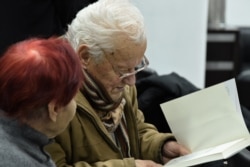 Scriitorul Vladimir Beșleagă s-a numărat printre invitații la discuția de la bibliotecă.