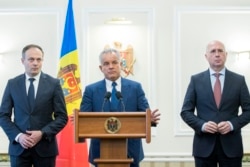 ანდრიან კანდუ, ვლად პლახოტნიუკი, პაველ ფილიპი. 2019 წლის 2 აპრილი