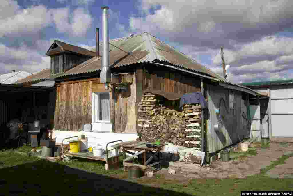This house has a pile of firewood outside. In the 1990s, local people were warned that wood stored radiation and should not be used for burning. But the village was not connected to a gas supply until 2016.
