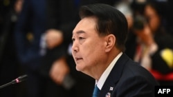 Президент Юн Сок Ёль.