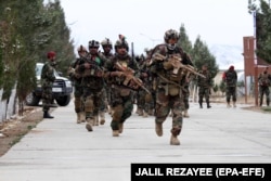Афганские спецназовцы готовятся отправиться в провинцию Бадгис в провинции Герате, Афганистан, 26 февраля 2021 года.