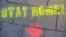 Grafitti făcut în Munchen, Germania cu sfatul generalizat „Stay Home" (Stați acasă)