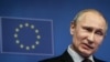 Belgium -- President of Russia Vladimir Putin reacting during a news conference at the end of a EU Russia Summit at the European Council headquarters in Brussels, January 28, 2014