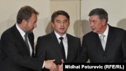 The members of Bosnia's tripartite presidency at their inaugural session in Sarajevo on November 10 (left to right: Bakir Izetbegovic, Zeljko Komsic, and Nebojsa Radmanovic)