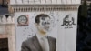 Un portret al lui Bashar al-Assad distrus de gloanțe în orașul Hama, la 6 decembrie.