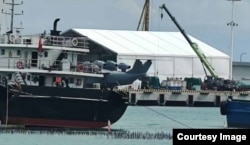 A rear view of the “Bohai Sea Monster” (center) which was the first glimpse of the vehicle seen on Chinese social media.