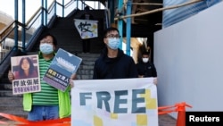 Илустрација - Продемократски демонстранти во Хонг Конг бараат ослободување на новинарката Жан