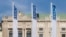 Austria - Flags wave in the wind in front of the entrance of the Permanent Council of the Organization for Security and Cooperation in Europe, in Vienna, February 15, 2022.
