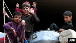  افغان کډوال له پاکستانه د ستنیدو په حال کې 