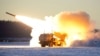 Un sistem de rachete de mare mobilitate (HIMARS), în timpul exercițiului RED FLAG-Alaska 21-1 la Fort Greely, Alaska, 22 octombrie 2020