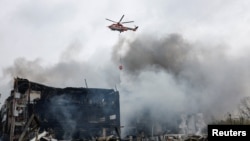 پر اوکراين د روسيې تر بريدونو وروسته د مرستندويه ادارې کارکوونکي اور وژني ـ د اکتوبر ۲۵مې انځور 