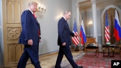 Donald Trump și Vladimir Putin la summitul din Finlanda, 16 iulie 2018.
