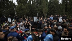 Похороны членов экипажа самолета Azerbaijan Airlines, разбившегося в Казахстане. Баку, 29 декабря 2024 года