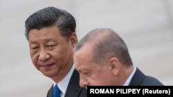 Președintele Turciei Recep, Tayyip Erdogan, și cel al Chinei, Xi Jinping