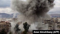 Дим над Східною Гутою у передмісті Дамаску, 22 лютого 2018 