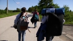 Camped Out In War-Damaged Bosnian Villages, Afghan Migrants Make Repeat Runs For EU Border