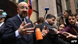 Decizia începerii negocierilor de aderare cu Moldova și Ucraina a fost anunțată mai întâi pe X de președintele Consiliului European, Charles Michel, cel care spunea miercuri Europei Libere că nu ia în calcul vreun eșec al summitului. ( Foto: JOHN THYS / AFP)