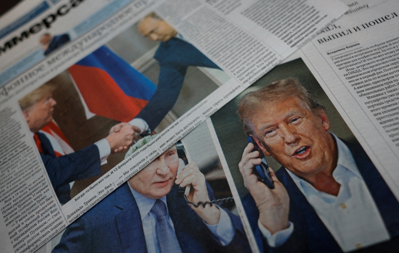 FILE PHOTO: Daily newspapers with covers, dedicated to the recent phone call of Russian President Vladimir Putin and U.S. President Donald Trump, are laid out at a newsstand in a street in Moscow, Russia, February 13, 2025. REUTERS/Maxim Shemetov/Illustration/File Photo/File Photo.