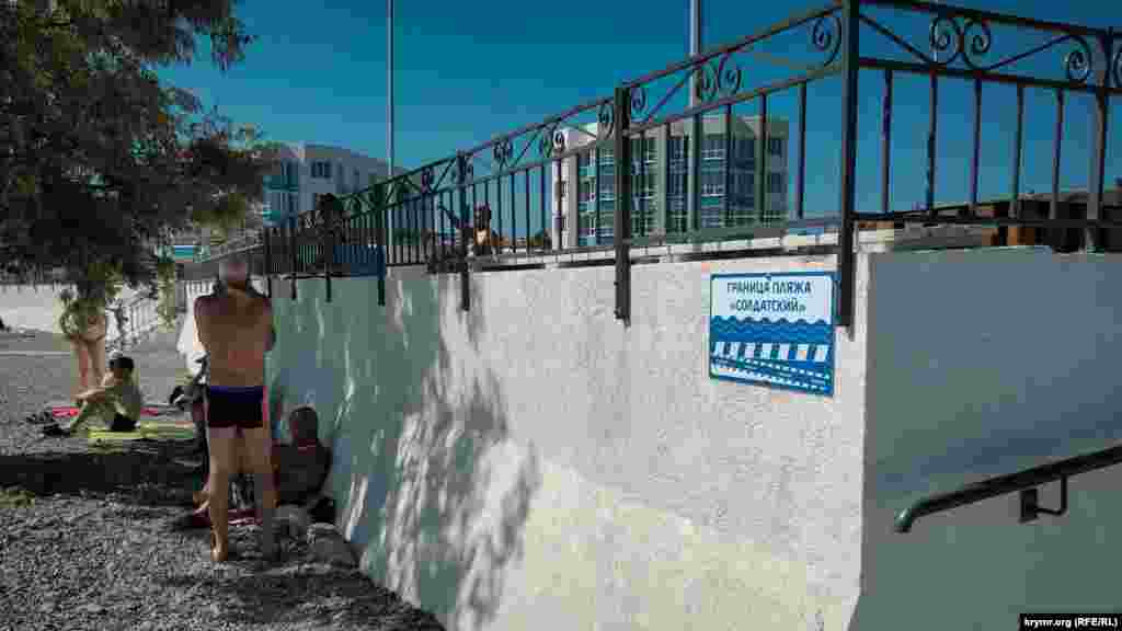 Raatlanıyıcılar yanğın terekniñ taldasında küneşten saqlanalar