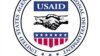 Birleşen Ştatlaryň Halkara ösüş agentliginiň (USAID) nyşany.