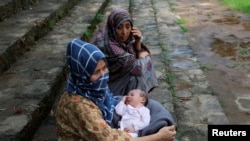 په اسلام اباد کې اوسېدونکې دوه افغان مېرمنې - د اګست ۱۵مې انځور