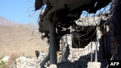 افغانستان - اسعدآباد کنر که در نتیجۀ حمله پاکستان در نومبر زیان دیده.