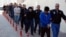 Граждане, которых Турция задержала за членство в движении Фетхуллаха Гюлена «Хизмет». Архивное фото. 